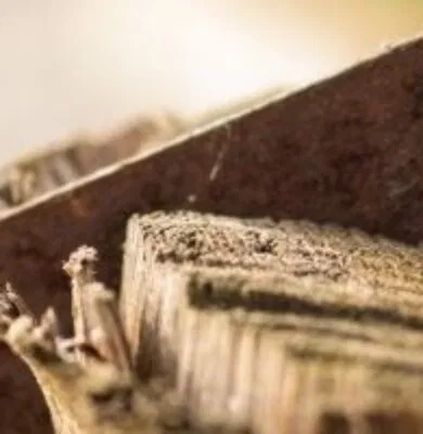 Saw on wooden background