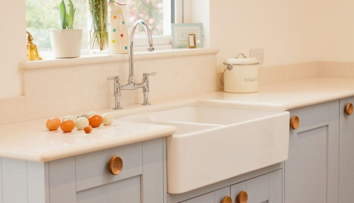 A beautiful farmhouse sink in a white kitchen.
