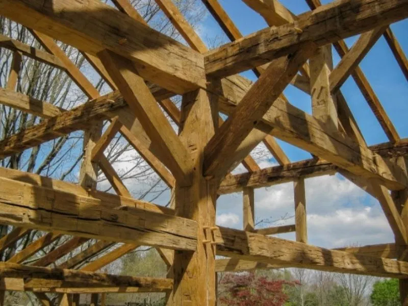 Hand Hewn beam structural garage with traditional mortise and tenon joinery. 
Material: Reclaimed White Oak hand hewn beams