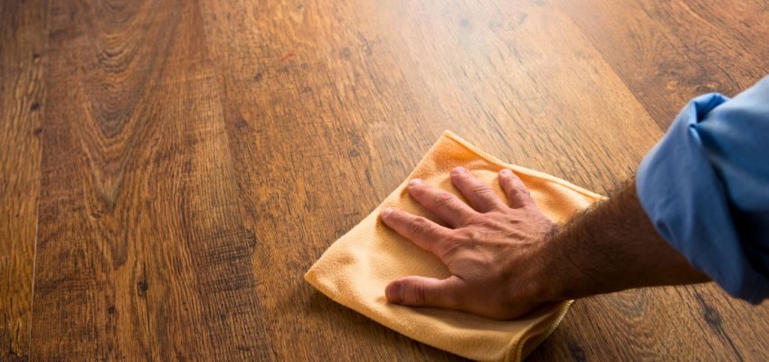 stain colors floor (3) The man uses wood-safe cleaning products to prevent damage to the wooden floors.