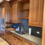 wall paneling and kitchen cabinets