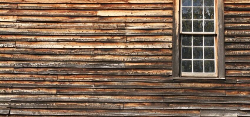 A wall made of hand-hewn beams.