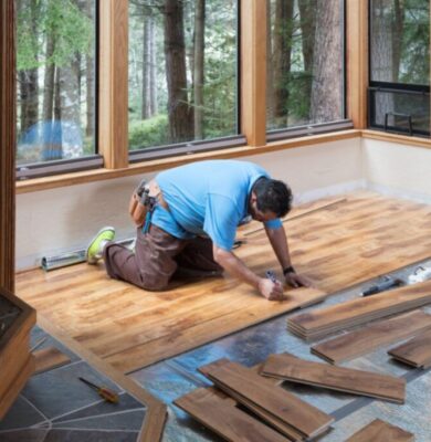 a man choosing the best wood filler for floors