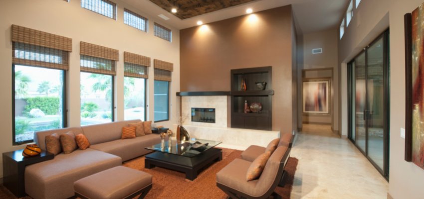 A living room with a high ceiling.