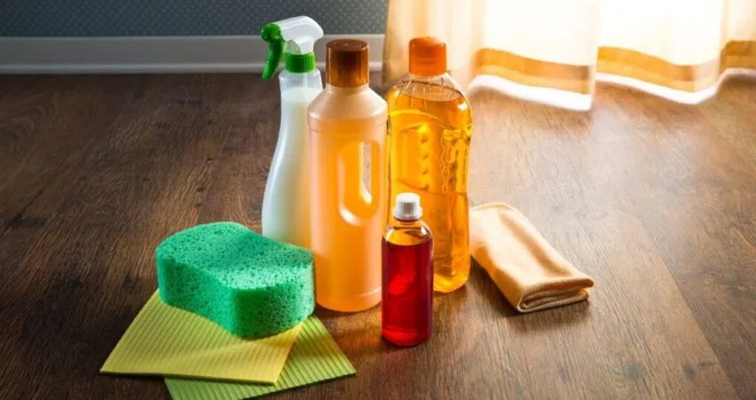 A set of homemade wood floor cleaners that will make the floor shine like new.
