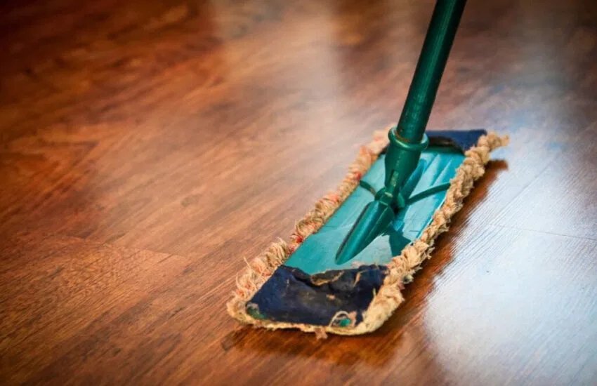 wood floor cleaner that shines homemade (1) A person mops the floor using a homemade wood floor cleaner that makes the floor shine.