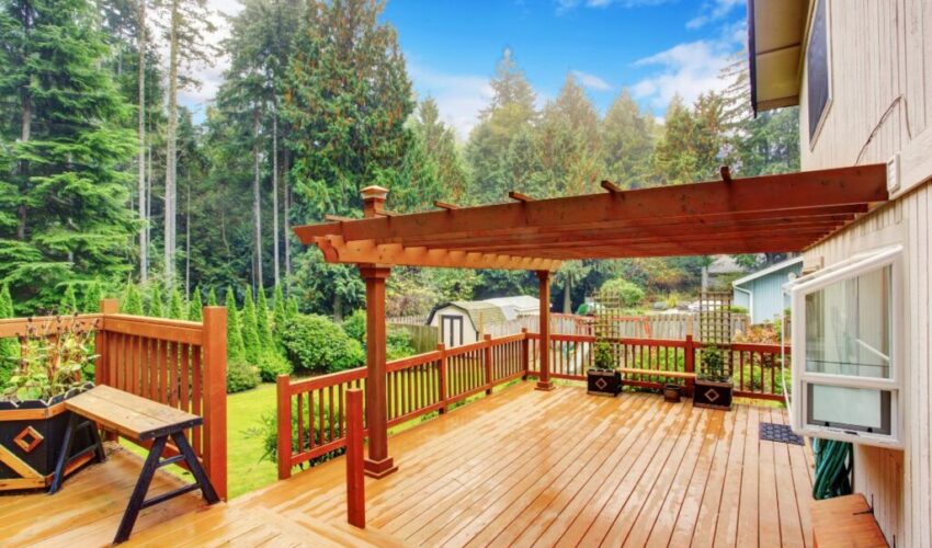 A house with a pergola on the deck.