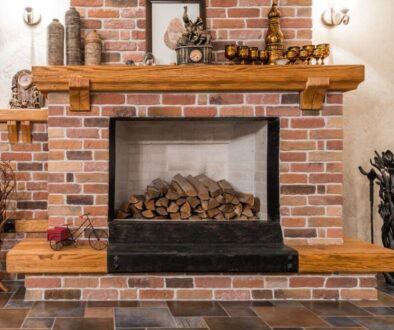 A home that installs a wood mantel for a brick fireplace.