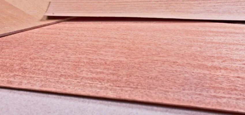 Mahogany is a tropical hardwood renowned for its durability, beautiful grain patterns, and rich reddish-brown color.
