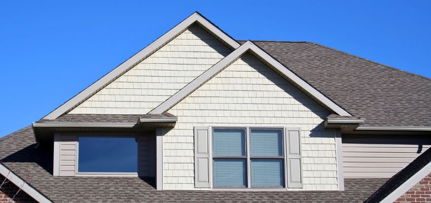minimum-roof-pitch2 Modern house with gable roof and shingles illustrating the minimum roof pitch required for proper drainage.