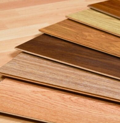 Collection of various wood floor colors displayed as planks, ranging from light beige to rich dark brown tones for interior design selection