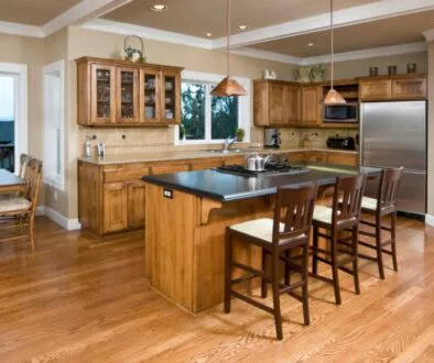 Wood floors bring a timeless beauty that suits various kitchen styles, from rustic to modern.