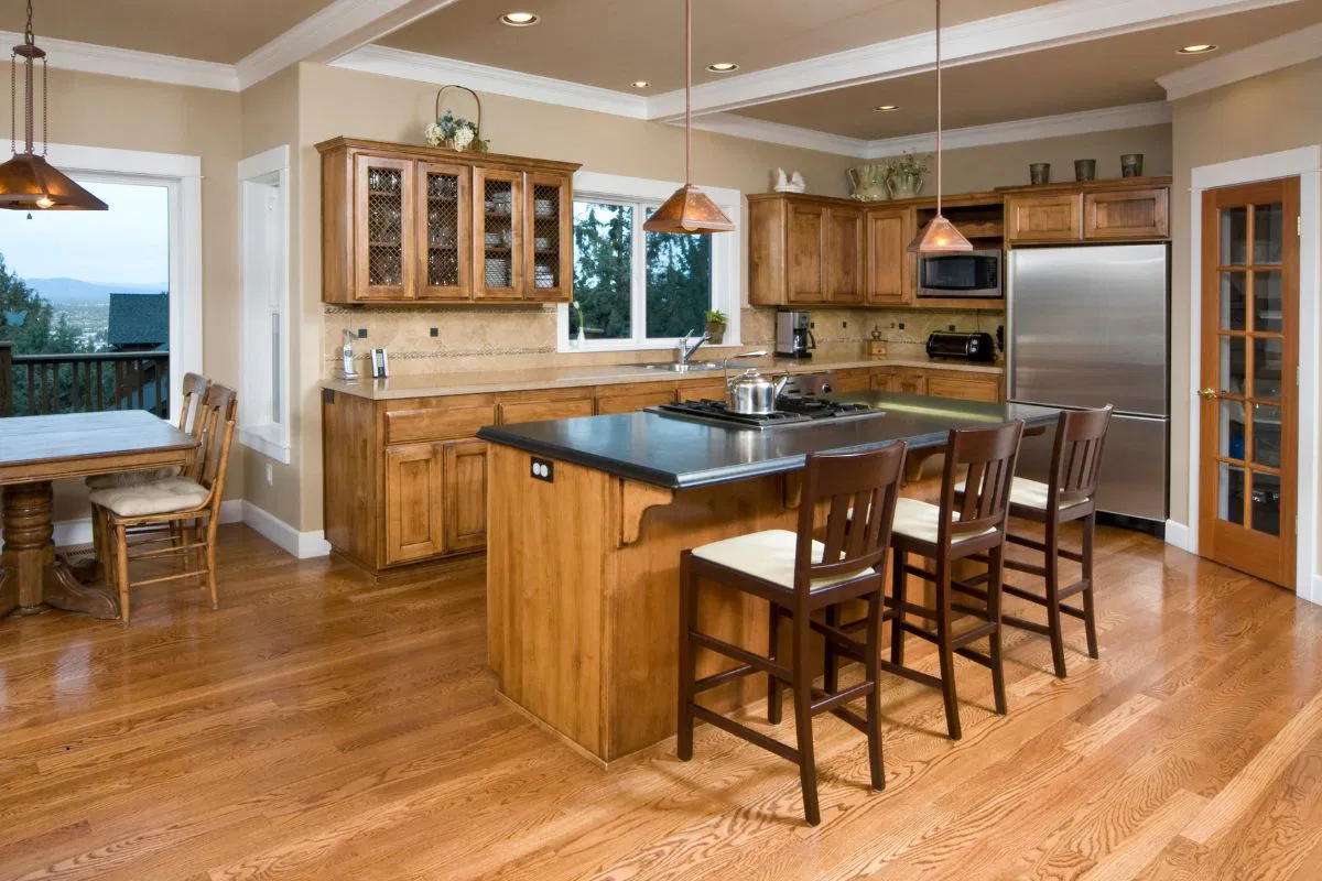 Wood floors bring a timeless beauty that suits various kitchen styles, from rustic to modern.