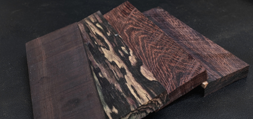 Exquisite dark luxury wood planks with dramatic grain, representing the most expensive wood