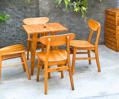 Stylish wooden dining set highlighting the pros and cons of rubberwood for furniture in everyday use.