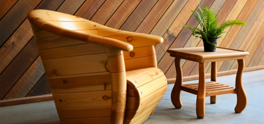 Handcrafted mango wood armchair and side table, highlighting the beauty and durability of mango wood furniture.