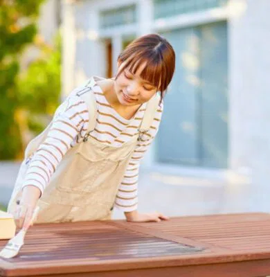 The woman learned how to refinish furniture.