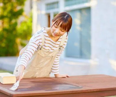 The woman learned how to refinish furniture.
