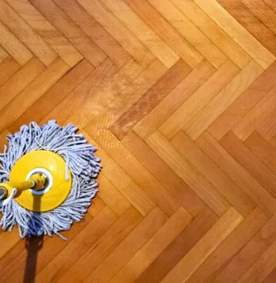 A visual showing how to clean unsealed wood floors without causing damage