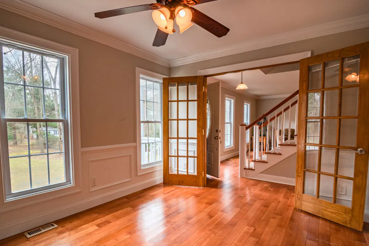 Classic French doors opening to a bright space, highlighting the best interior doors for modern homes.